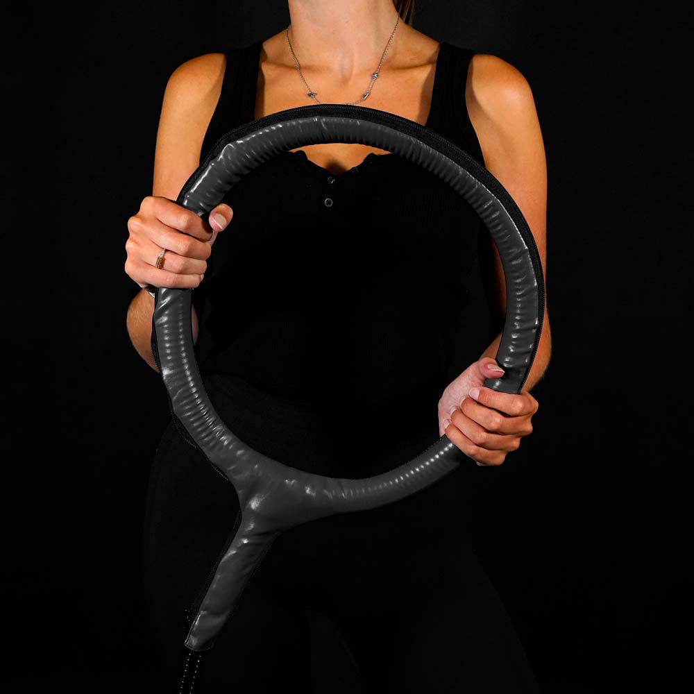 Women holding large loop coil on arm