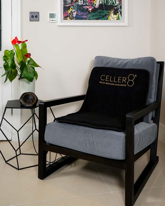 Women adjusting CELLER8 next to pool