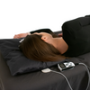 FlexPulse Gen 2 PEMF device being used under a pillow to aid sleep